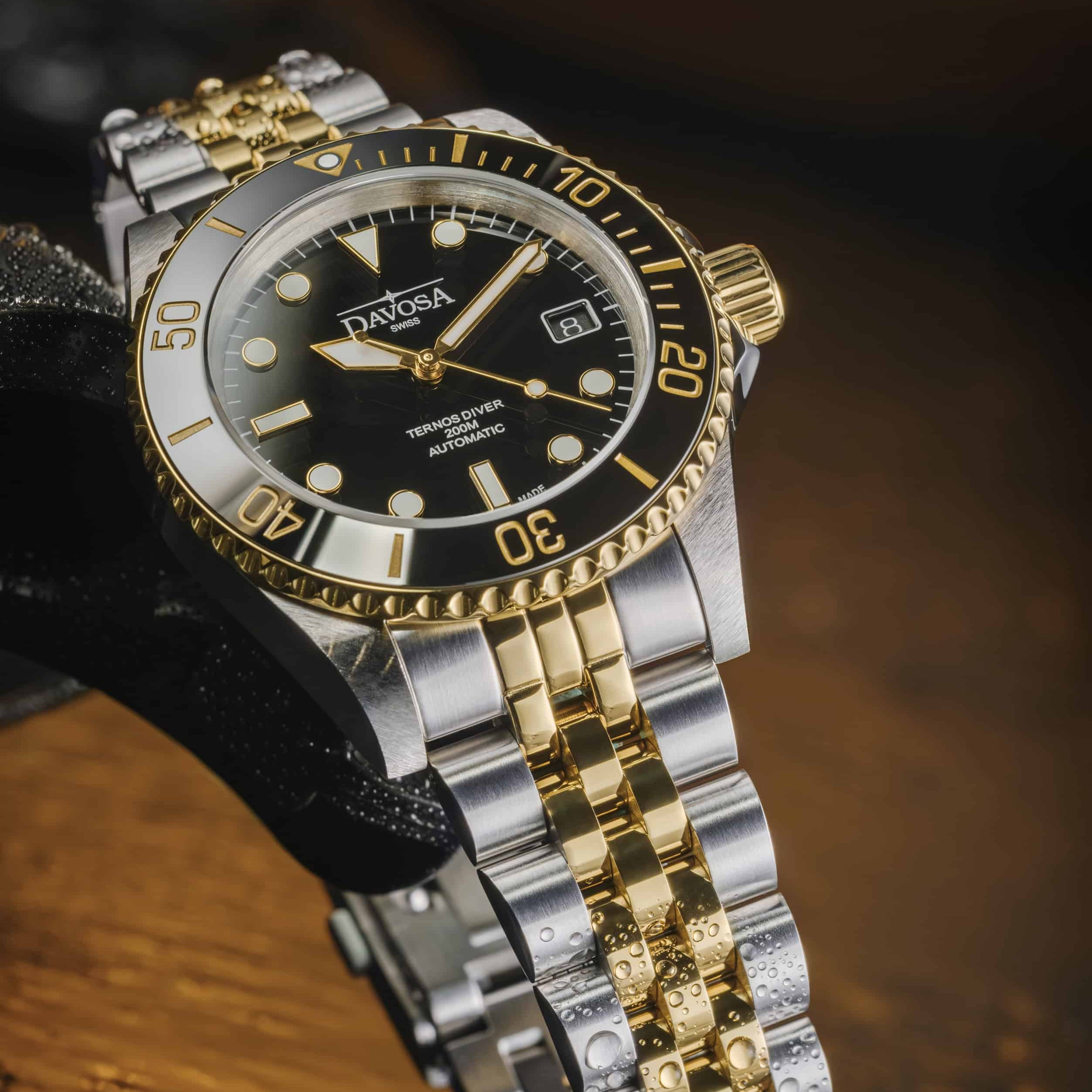 Ternos Diver Automatic Two-Tone 200m Swiss-Made Gold and Black Unisex Diver Watch 161.551.05 Without Loupe and Pentalink Bracelet Diver Davosa USA Official Distributor. Prices are Final. Tax & duties included.