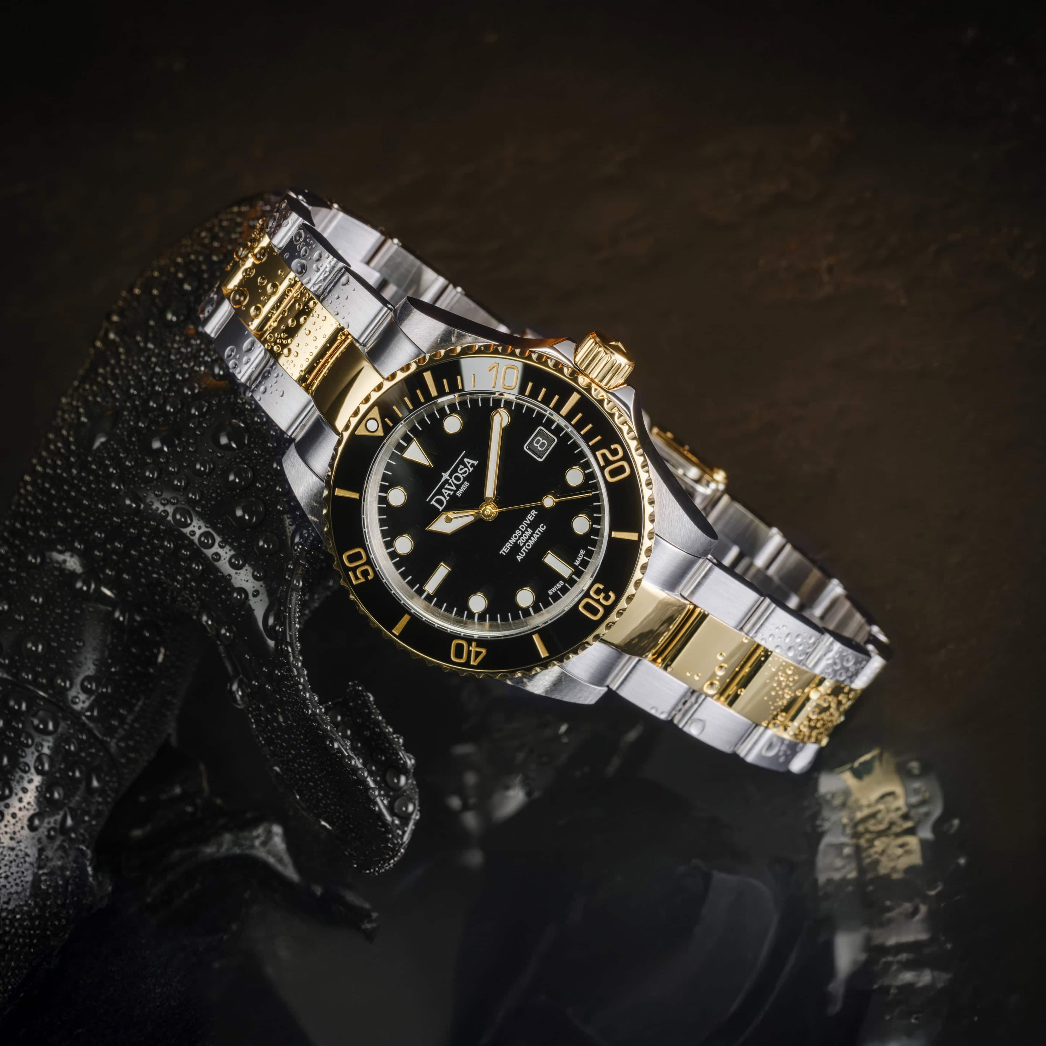 Ternos Diver Automatic Two-Tone 200m Swiss-Made Gold and Black Unisex Diver Watch 161.551.50 Without Loupe Diver Davosa USA Official Distributor. Prices are Final. Tax & duties included.