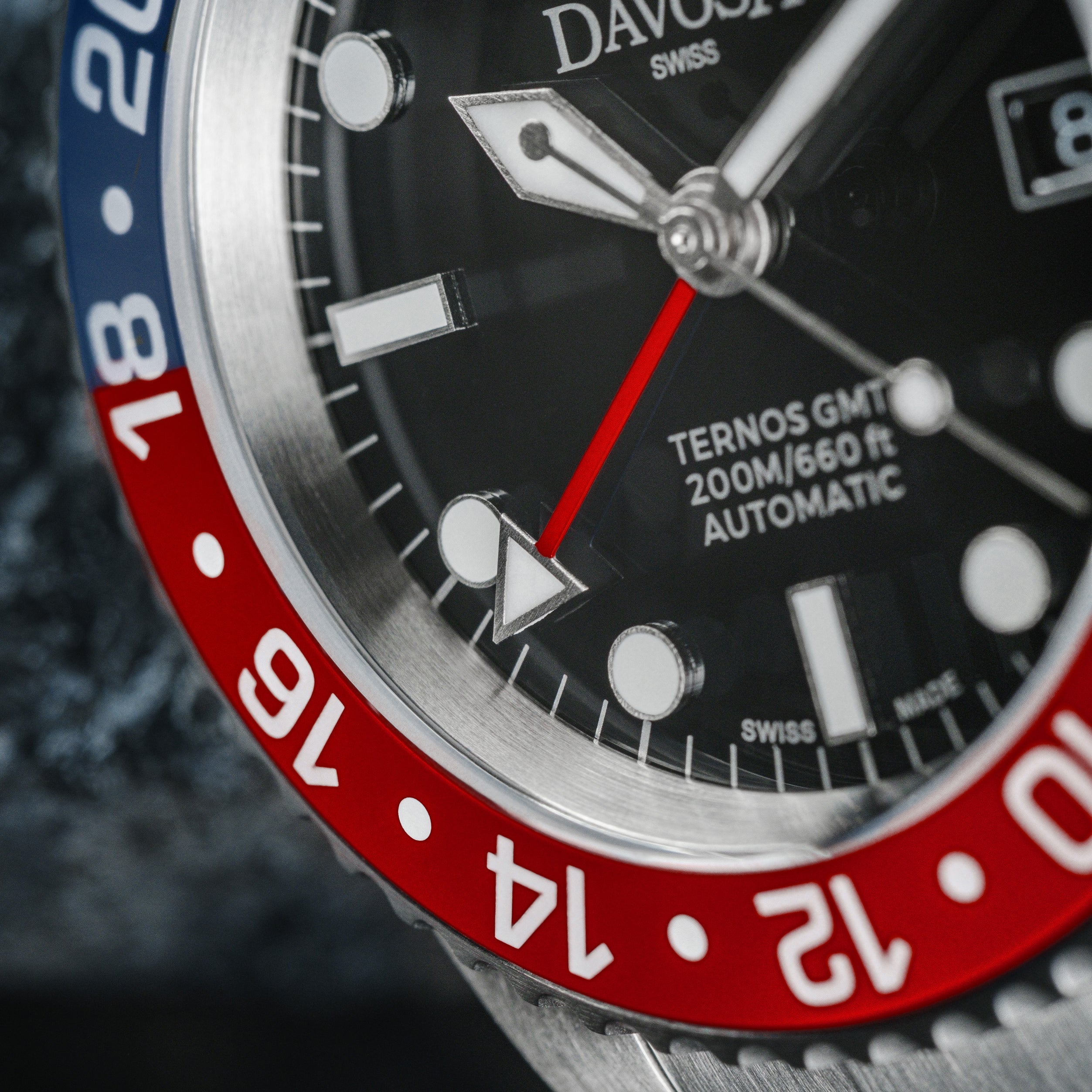 DAVOSA Ternos GMT 40mm Automatic - Swiss Made Dual Time Zone Diver’s Watch - Blue and Red with Loupe Ref. 161.564.60 GMT Davosa USA Official Distributor. Prices are Final. Tax & duties included.