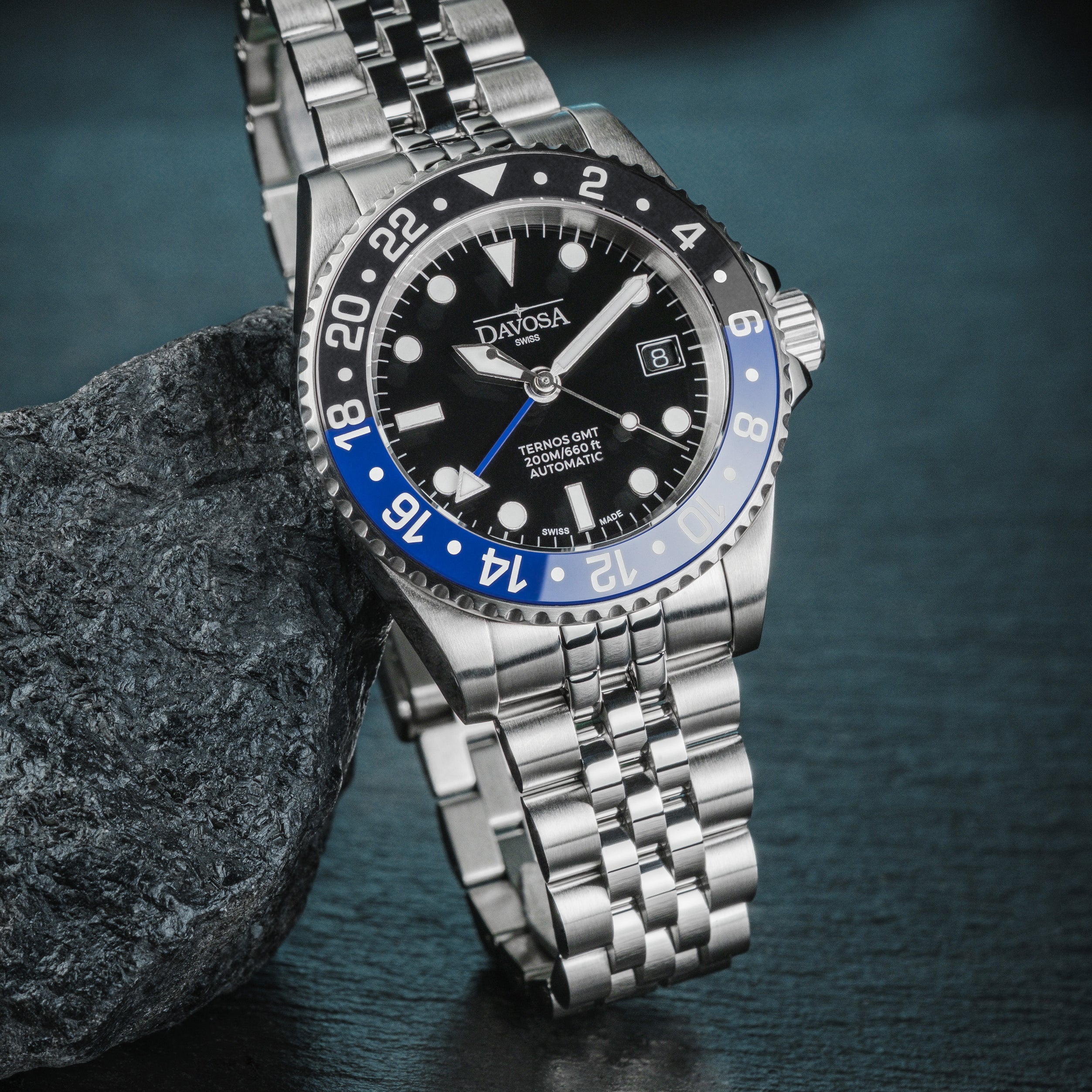 DAVOSA Ternos GMT 40mm Automatic - Swiss Made Dual Time Zone Diver’s Watch - Blue and Black with Loupe Ref. 161.564.04 GMT Davosa USA Official Distributor. Prices are Final. Tax & duties included.