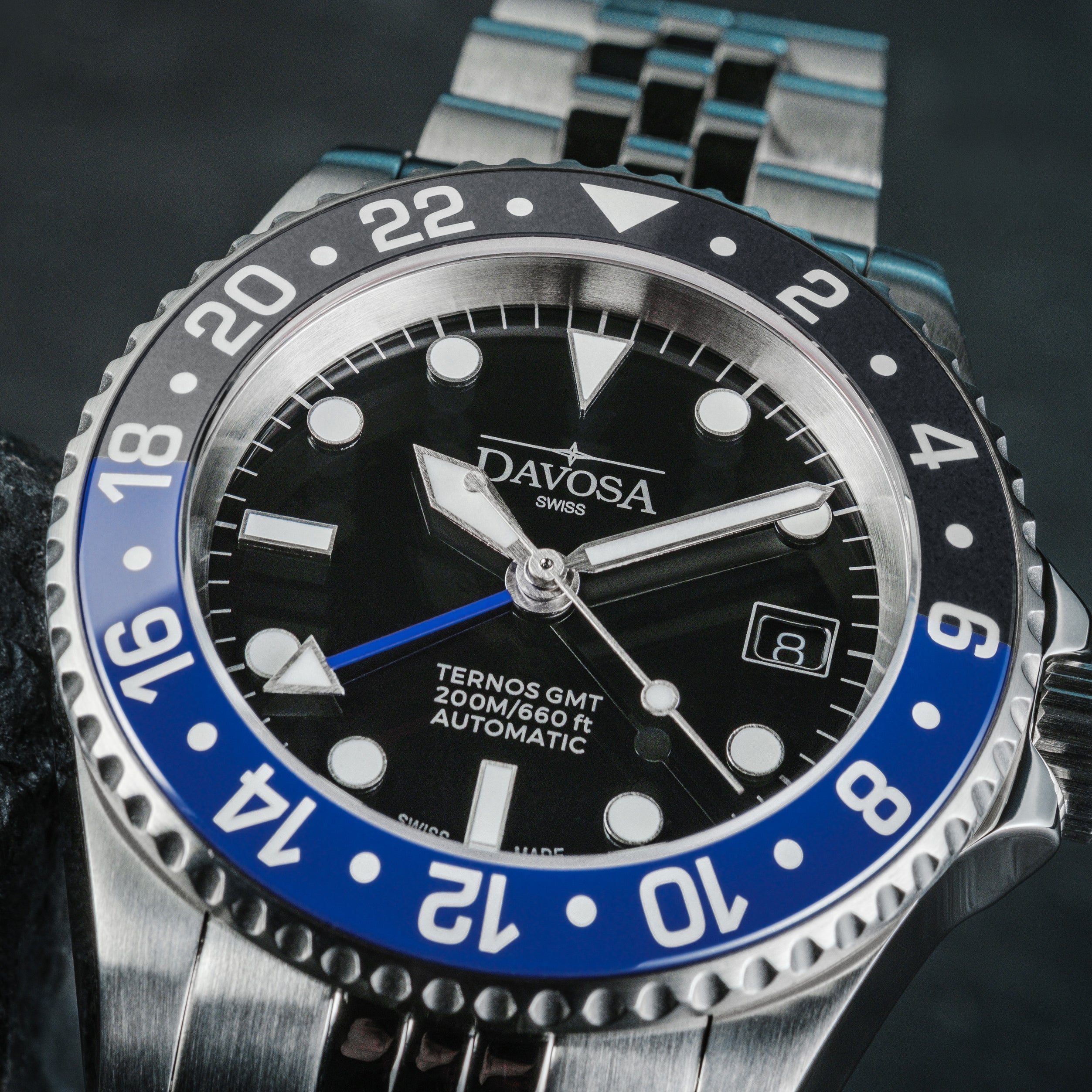 DAVOSA Ternos GMT 40mm Automatic - Swiss Made Dual Time Zone Diver’s Watch - Blue and Black with Loupe Ref. 161.564.04 GMT Davosa USA Official Distributor. Prices are Final. Tax & duties included.