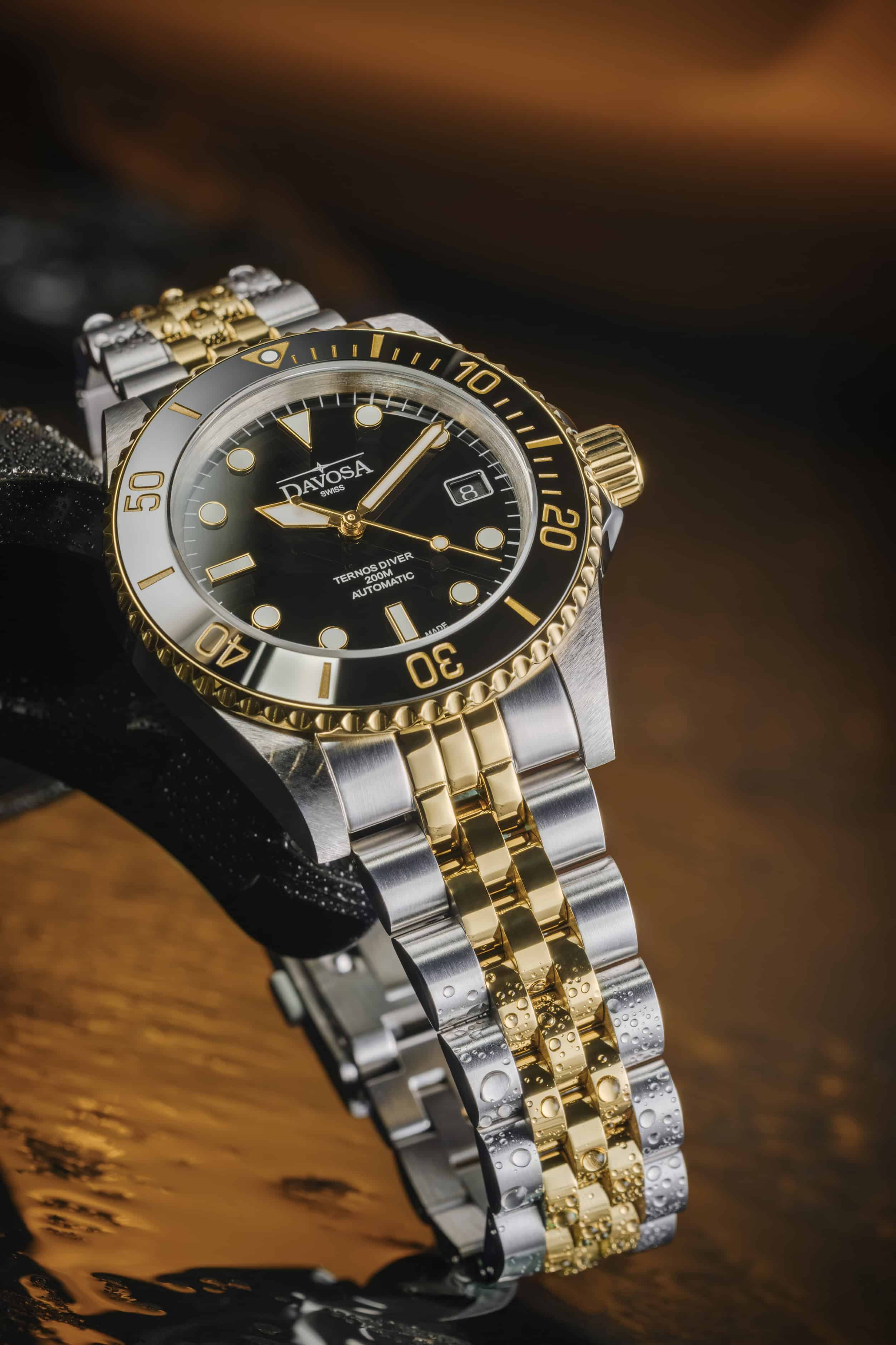Ternos Diver Automatic Two-Tone 200m Swiss-Made Gold and Black Unisex Diver Watch 161.551.05 Without Loupe and Pentalink Bracelet Diver Davosa USA Official Distributor. Prices are Final. Tax & duties included.