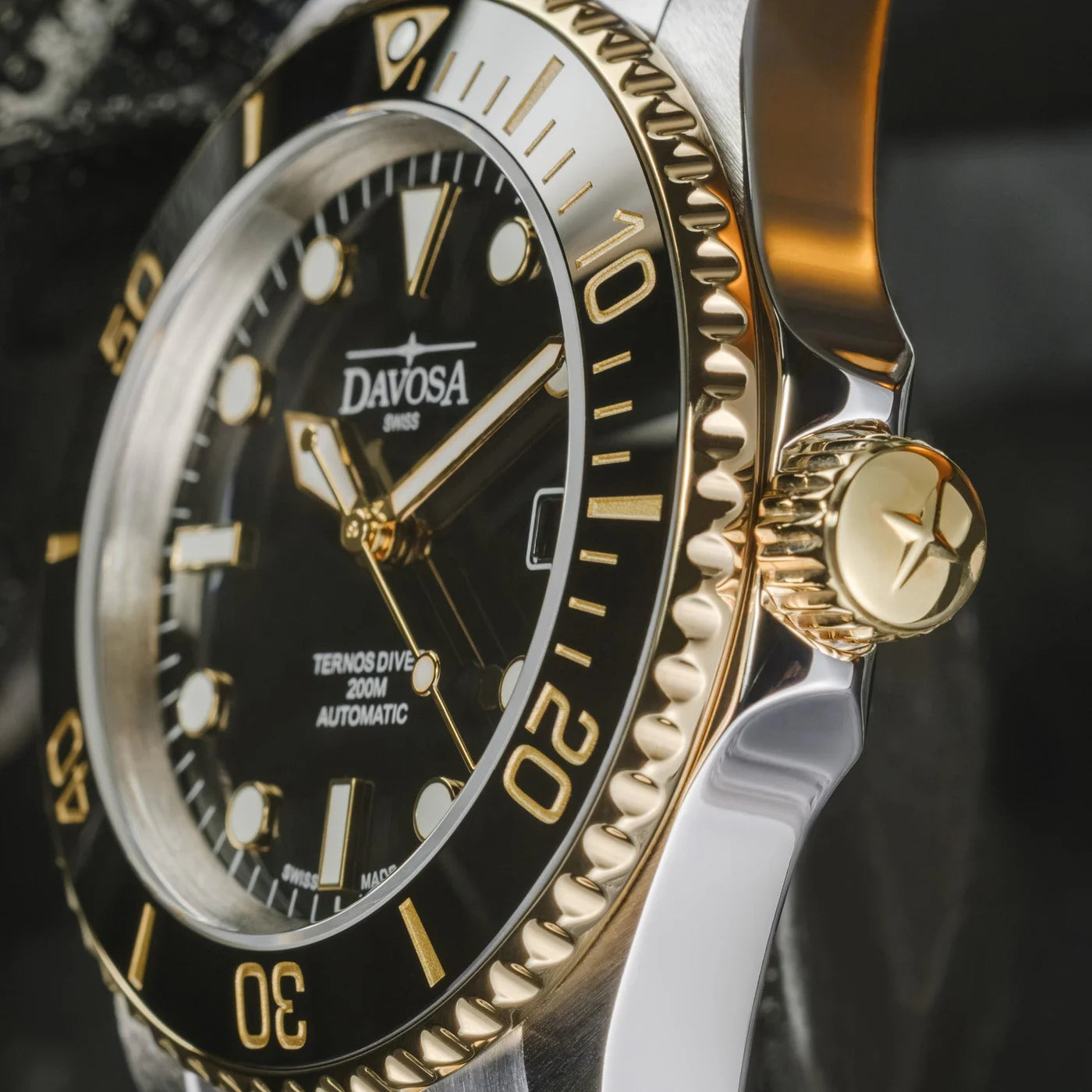 Ternos Diver Automatic Two-Tone 200m Swiss-Made Gold and Black Unisex Diver Watch 161.551.05 Without Loupe and Pentalink Bracelet Diver Davosa USA Official Distributor. Prices are Final. Tax & duties included.
