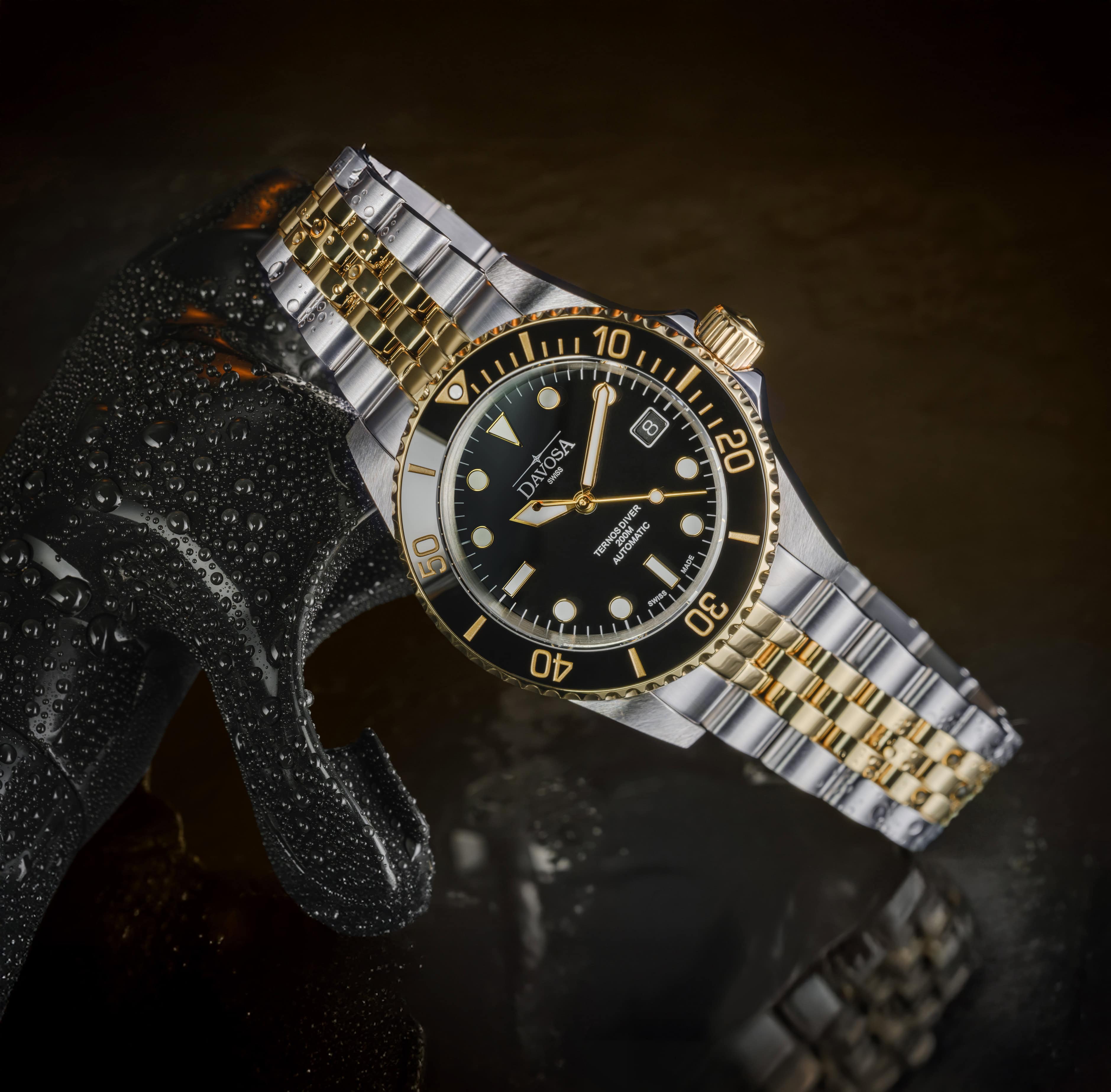Ternos Diver Automatic Two-Tone 200m Swiss-Made Gold and Black Unisex Diver Watch 161.551.05 Without Loupe and Pentalink Bracelet Diver Davosa USA Official Distributor. Prices are Final. Tax & duties included.
