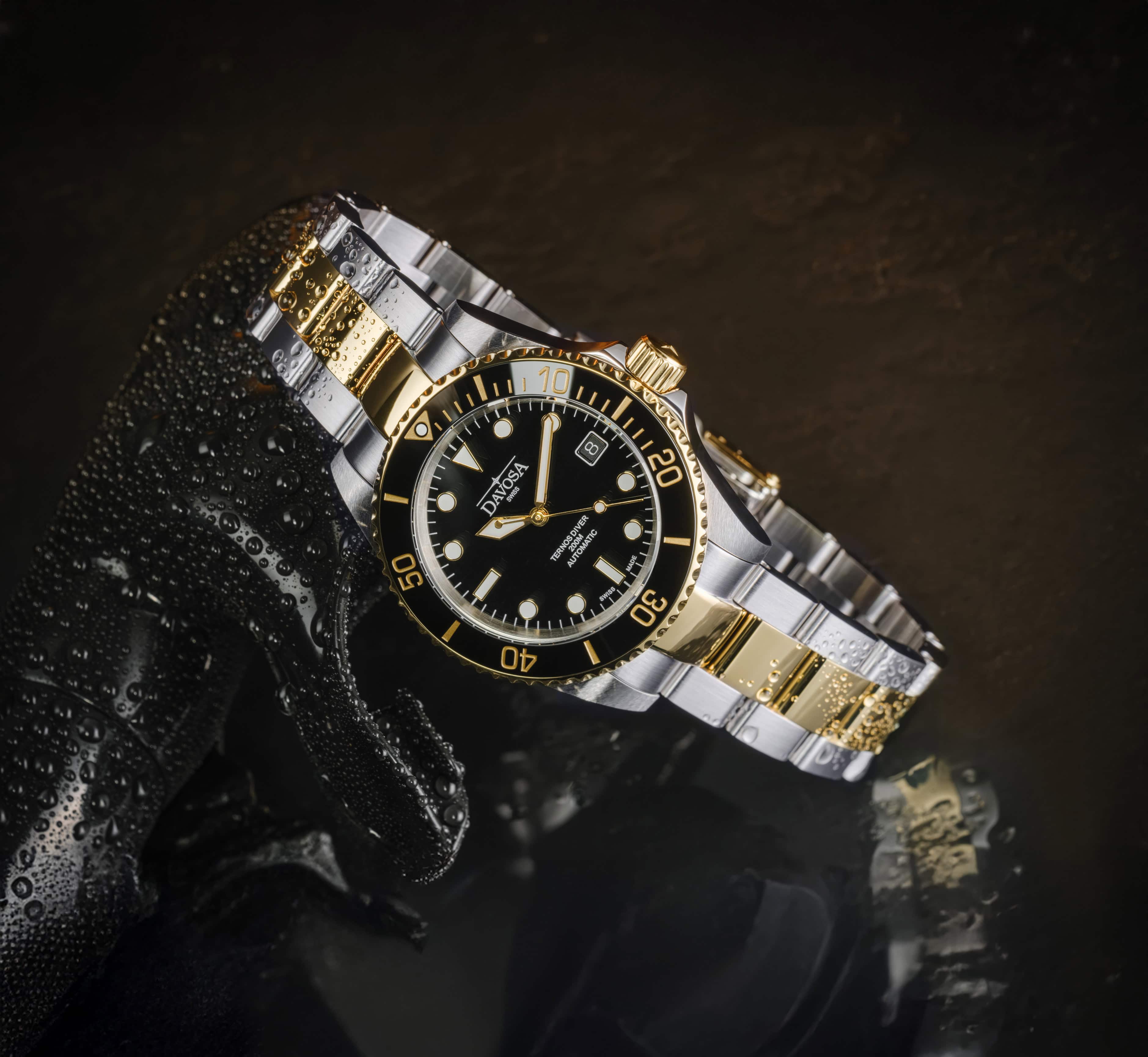 Ternos Diver Automatic Two-Tone 200m Swiss-Made Gold and Black Unisex Diver Watch 161.551.50 Without Loupe Diver Davosa USA Official Distributor. Prices are Final. Tax & duties included.