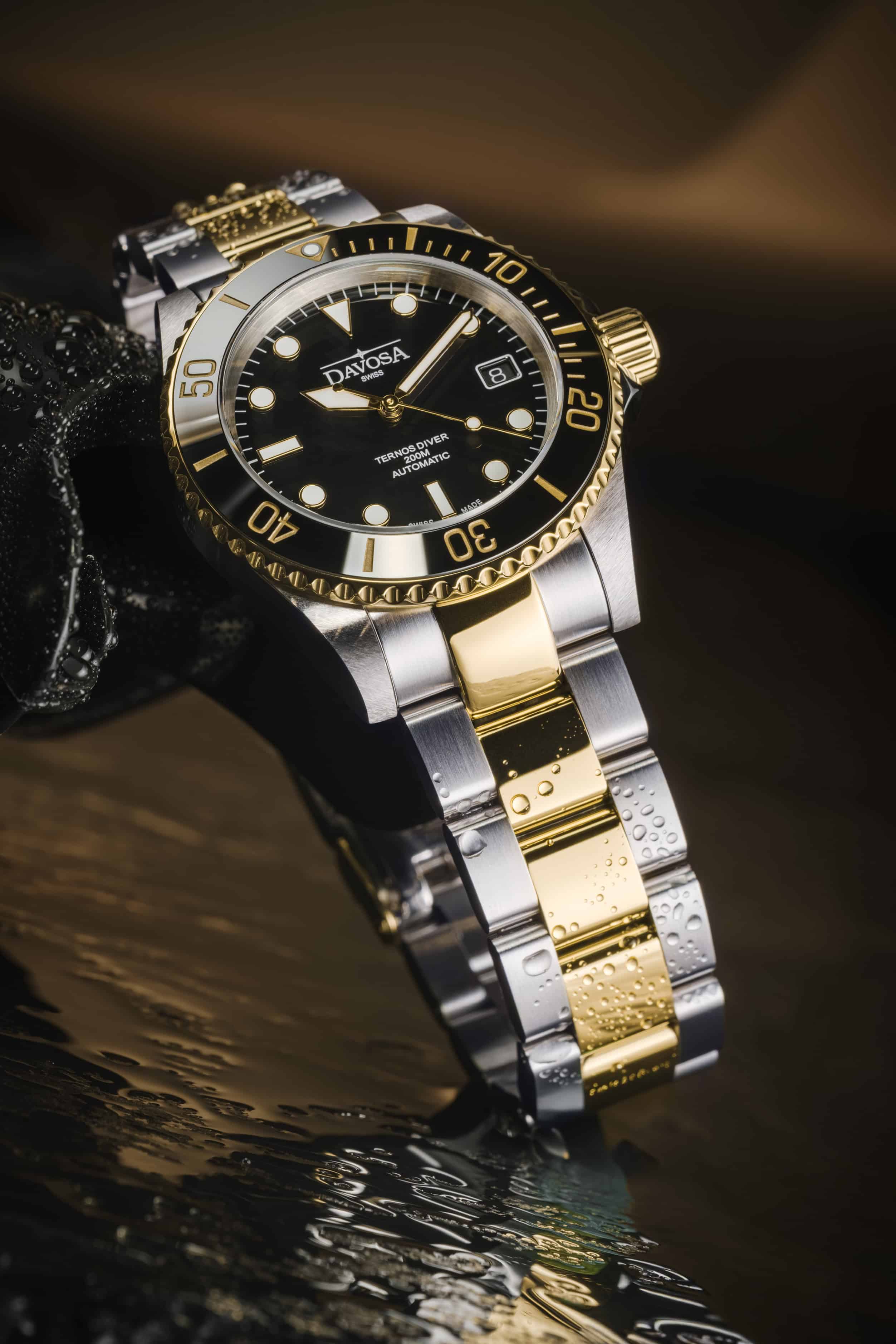Ternos Diver Automatic Two-Tone 200m Swiss-Made Gold and Black Unisex Diver Watch 161.551.50 Without Loupe Diver Davosa USA Official Distributor. Prices are Final. Tax & duties included.