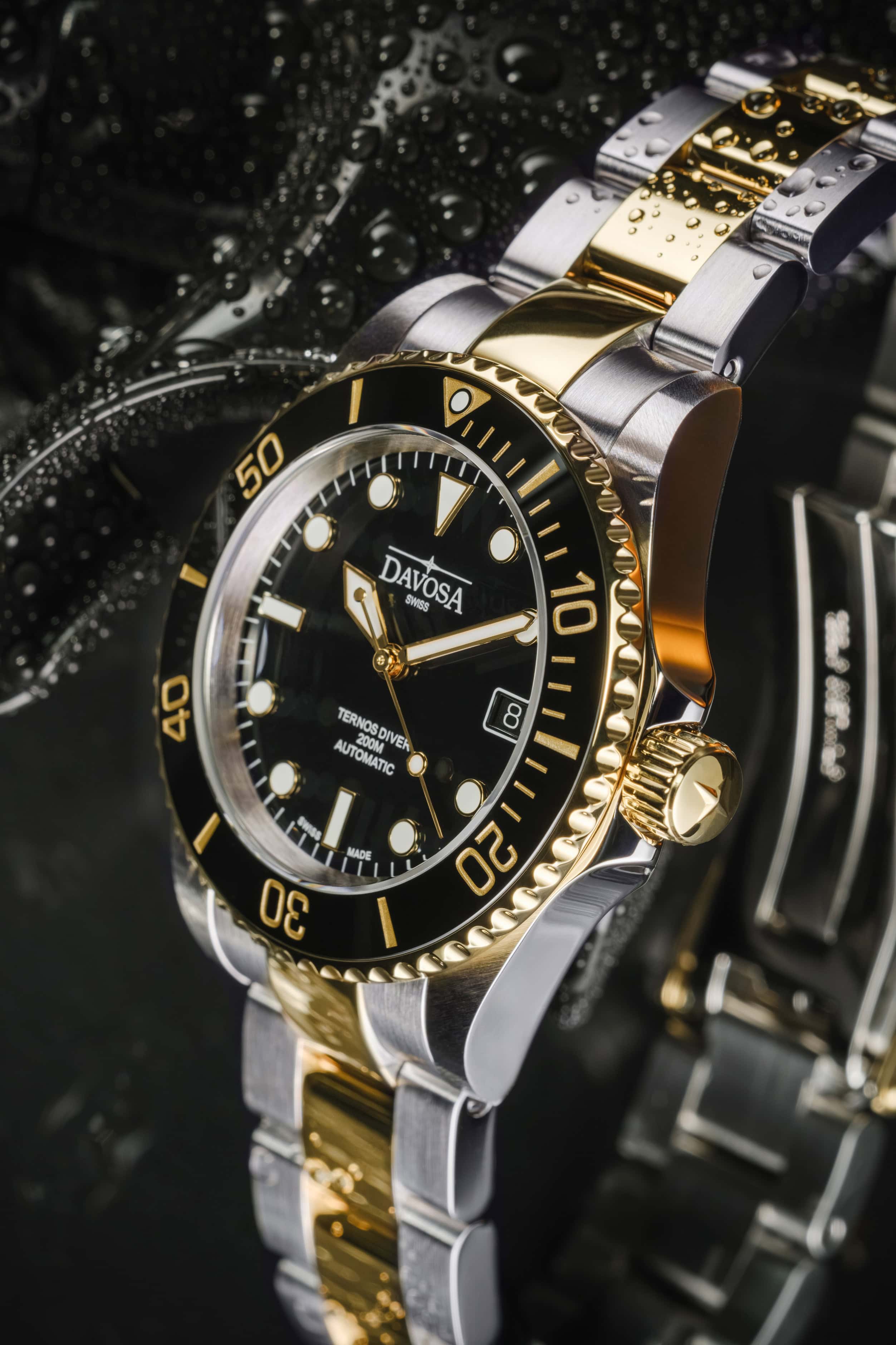 Ternos Diver Automatic Two-Tone 200m Swiss-Made Gold and Black Unisex Diver Watch 161.551.50 Without Loupe Diver Davosa USA Official Distributor. Prices are Final. Tax & duties included.
