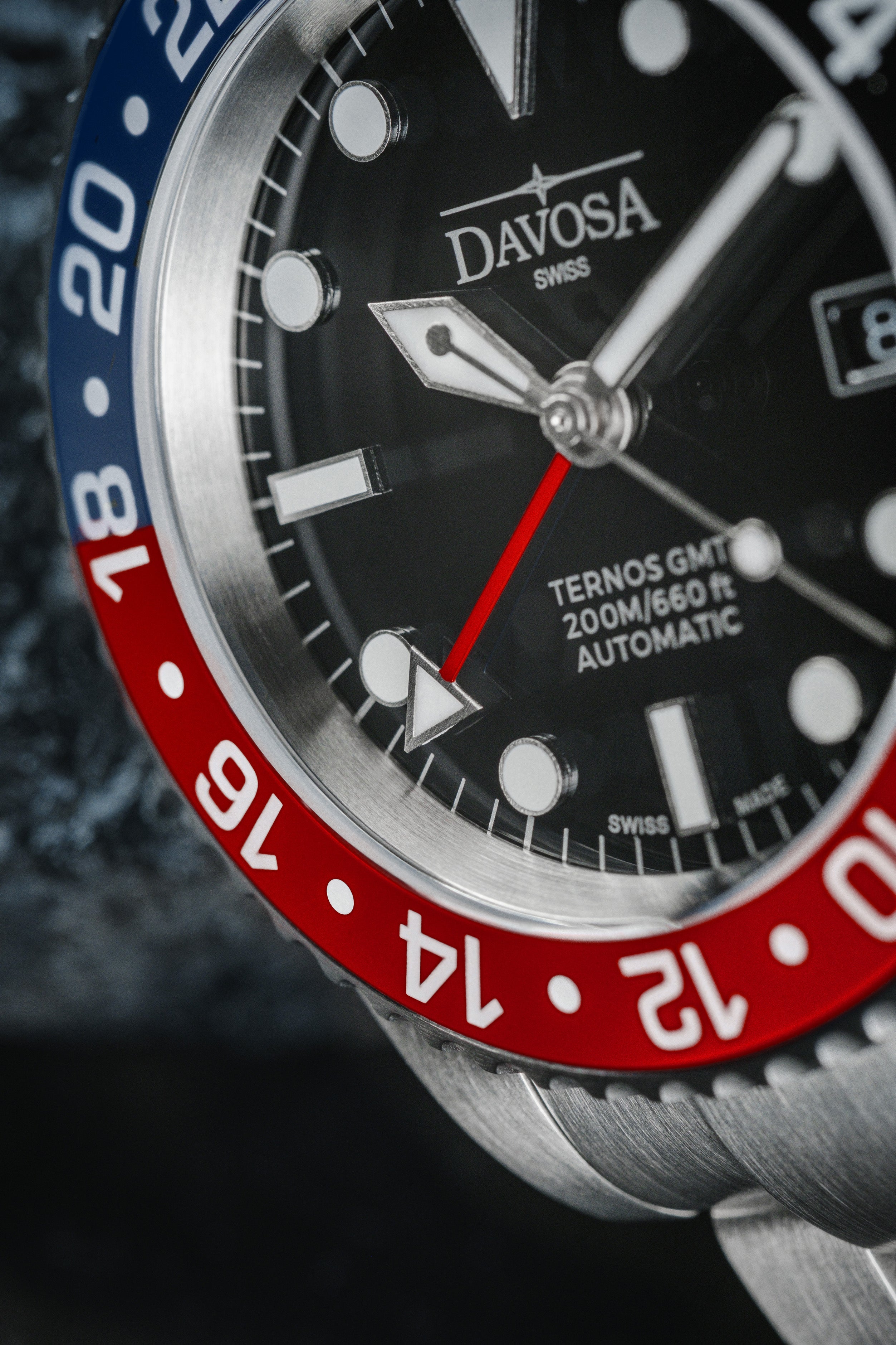 DAVOSA Ternos GMT 40mm Automatic - Swiss Made Dual Time Zone Diver’s Watch - Blue and Red with Loupe Ref. 161.564.60 GMT Davosa USA Official Distributor. Prices are Final. Tax & duties included.